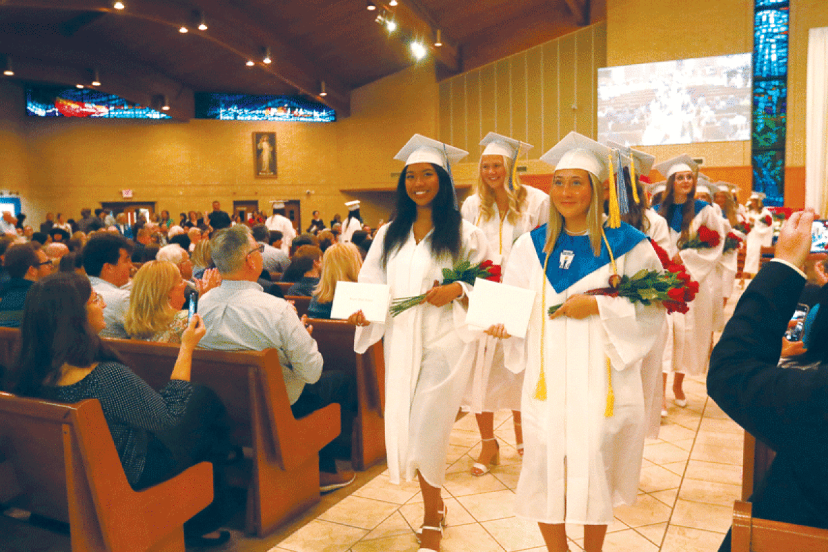  Sixty-three students from Regina High School graduated during a commencement ceremony May 25  at St. Isidore Church in Macomb Township.  