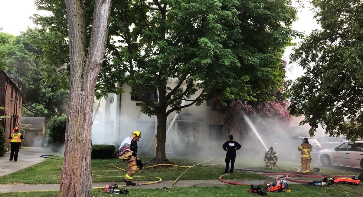  Firefighters from Grosse Pointe City, Grosse Pointe Farms and Grosse Pointe Park battle a three-alarm fire that ripped through a home in the 400 block of Lincoln Road in Grosse Pointe City June 3. 