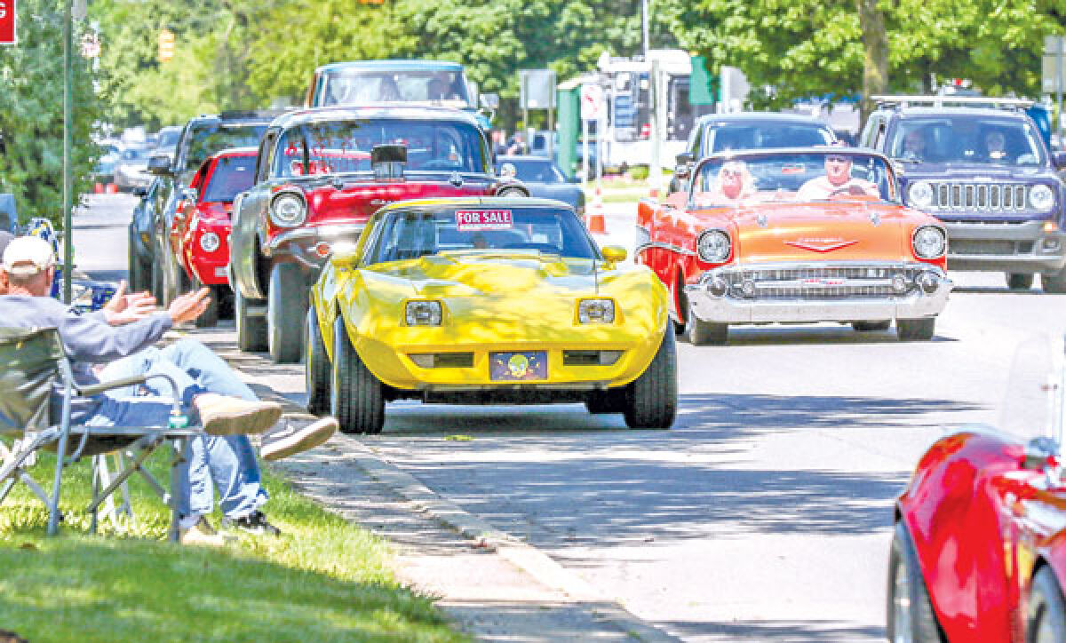  Spectators enjoy the many classic vehicles at Eastpointe Cruisin’ Gratiot in 2022. 