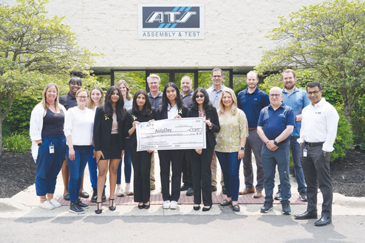  Aid2Day representatives, including co-founders Heera and Kavya, center, are pictured with representatives from ATS Automation’s Wixom branch, which partnered with Aid2Day to donate $1,500 to support the nonprofit’s second annual gift drive. 