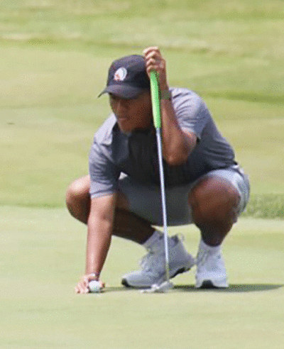  Bloomfield Hills Brother Rice senior Lorenzo Pinili analyzes a putt at the Michigan High School Athletic Association Division 2 State Finals at The Fortress in Frankenmuth June 10. 