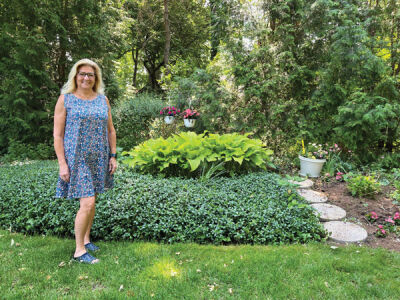  Elizabeth Haggerty, of Oak River Court, shows off her green thumb as she prepares to be featured in the 2023 Troy Garden Walk. Each year, the Troy Garden Club shows off some of the best and most devoted gardeners in the city with their annual Garden Walk. 