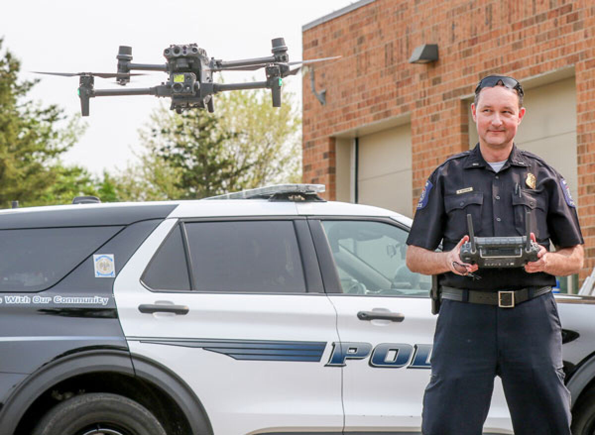  Lt. Keith Wuotinen operates one of the Novi Police Department’s two drones at the department in May. Wuotinen started the department’s drone program last year and started training other officers to operate the drones. Fourteen officers are certified to operate them now. 