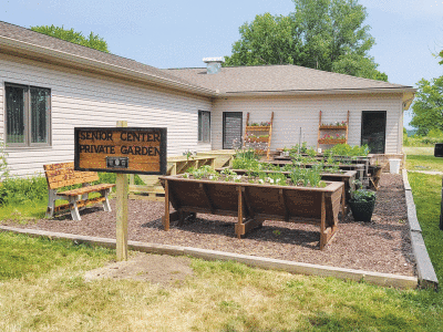   Hand-built planters and benches bring new life to the  Harrison Township Senior Center garden, built as part of Edwards’  Eagle Scout project. 