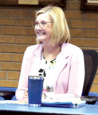  New St. Clair Shores Finance Director Renae Warnke sits at a table with other members of the city administration during the June 19 City Council meeting. 