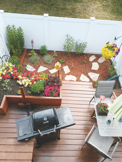  Raymond Patrick, of Utica, has designed his backyard in a creative way that  incorporates features of a larger space into a smaller yard. 