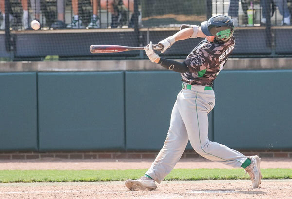  Novi junior Brendon Bennett smokes a base hit during the Michigan High School Athletic Association Division 1 State Finals against Brownstown Woodhaven on June 17 at Michigan State University. 