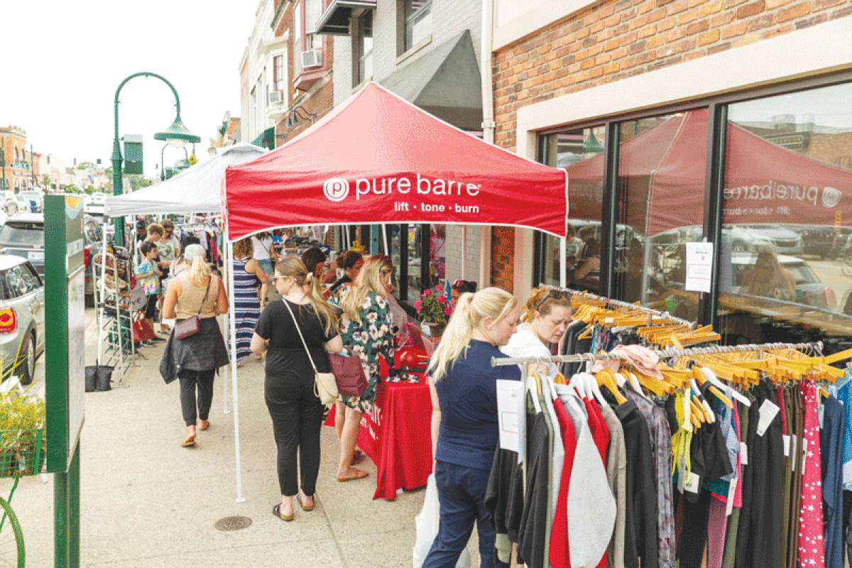  Shoppers hunt for bargains during a past sale event in downtown Rochester.  