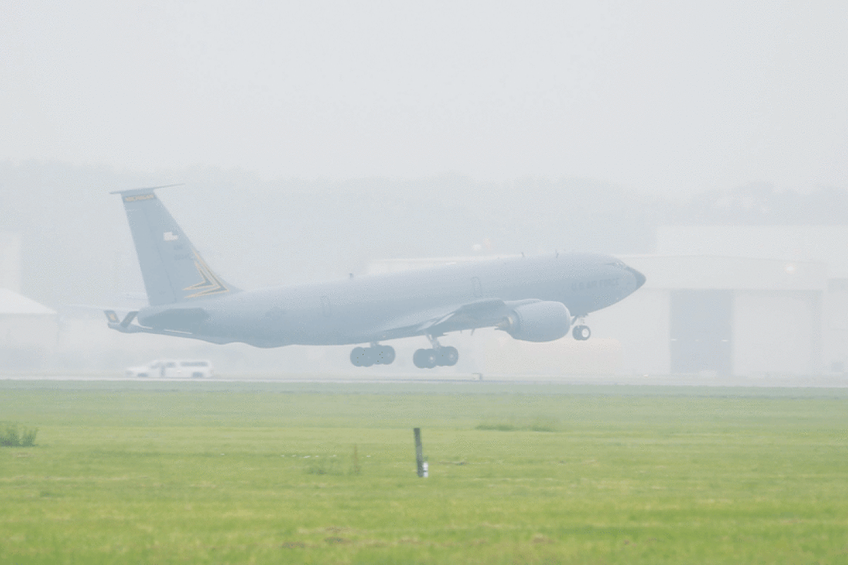  A KC-135 Stratotanker takes off from Selfridge Air National Guard Base on a foggy and rainy morning June 27. Two KC-135s were joined by two A-10 Warthog attack jets from SANGB for a statewide flyover as part of a nationwide celebration of 100 years of in-flight refueling.  