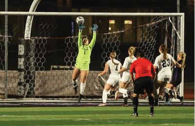  Bloomfield Hills junior goalkeeper Jenica Opdahl makes a save during a game this season. 