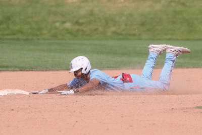  Liggett senior shortstop Jarren Purify slides safely into second base. 
