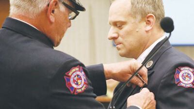  Clerk and firefighters honored by Macomb board 