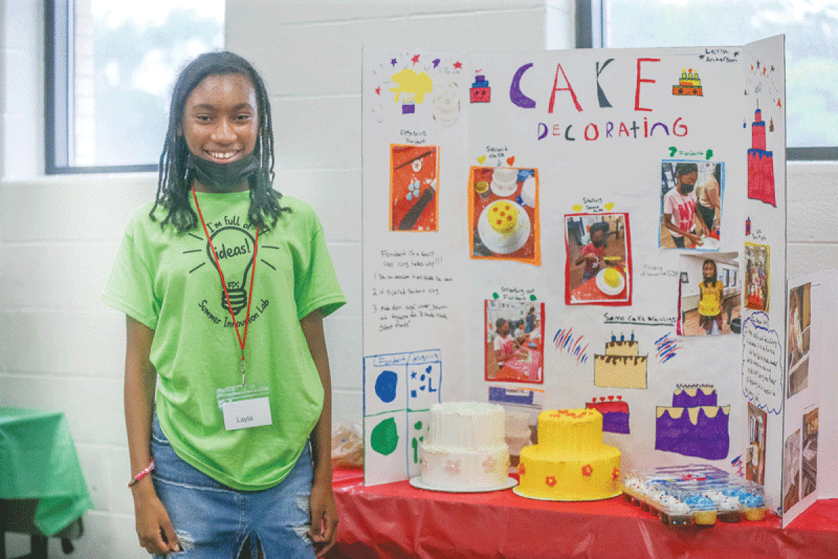  Layla Anderson, an eighth grade student at East Middle School, primarily baked chocolate cakes, before learning cake decorating through the Summer Innovation Program. She can now  use fondant to decorate cakes.  