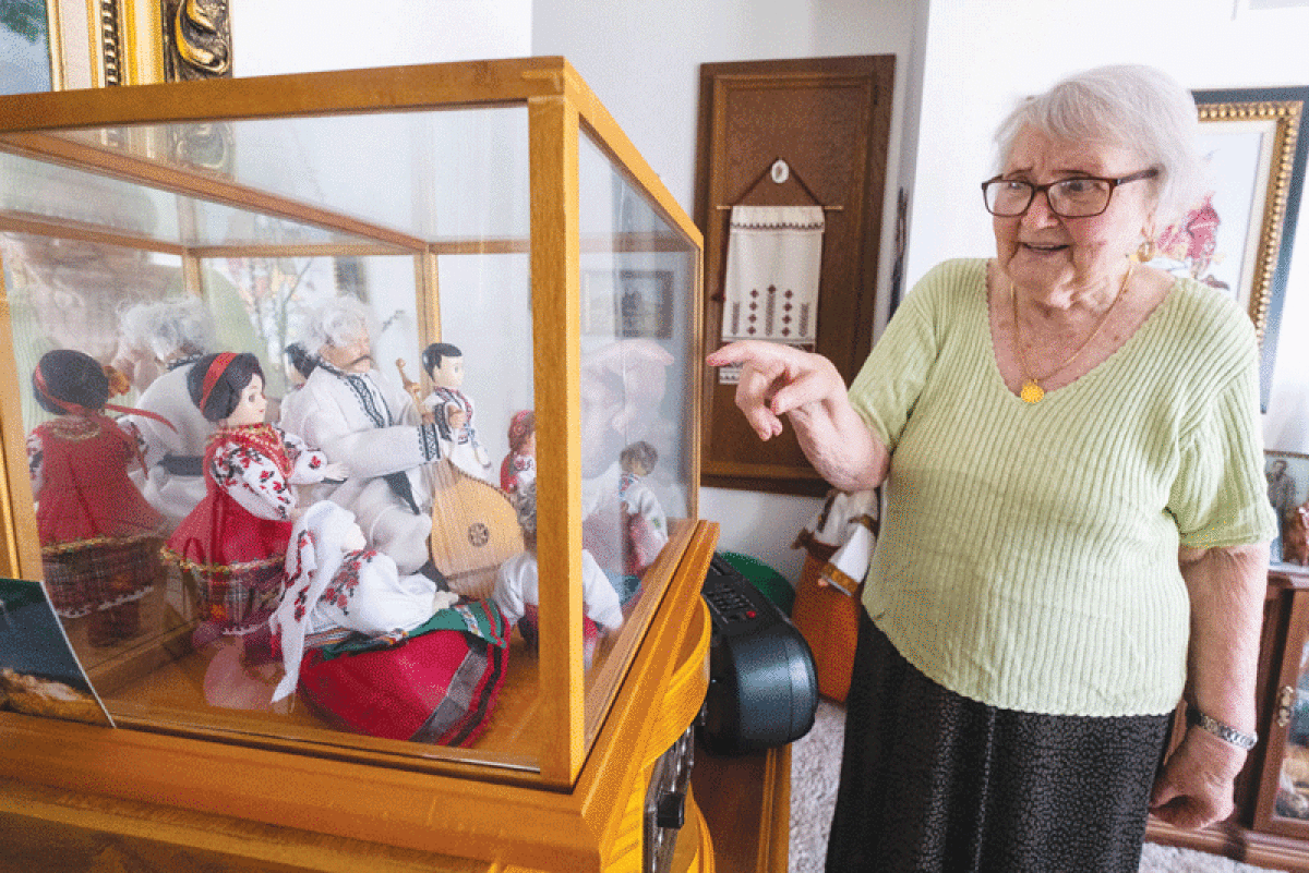  Olena Papiz, a Ukrainian who immigrated to Warren after World War II, talks about dolls wearing clothes she embroidered. 