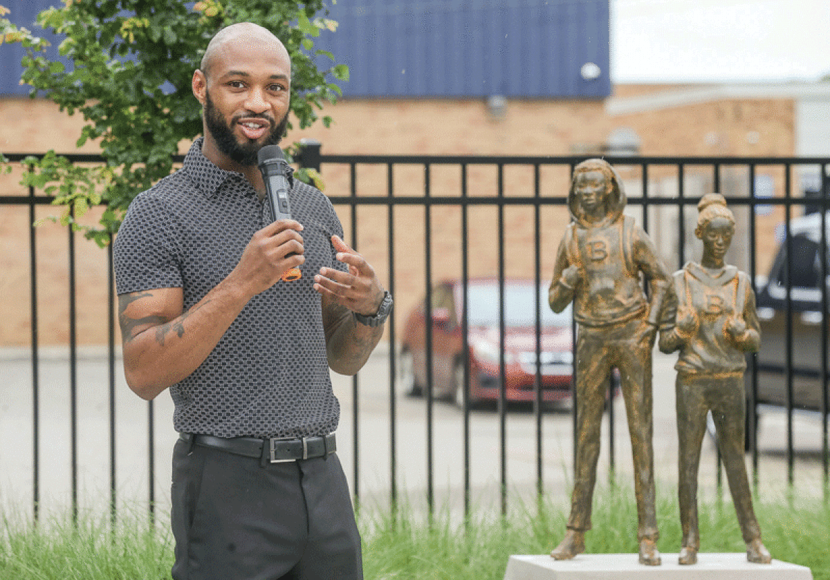   Berkley High School 2013 graduate and Detroit sculptor Austen Brantley talks about his time at his former school near the sculpture  that he made for the space, “Walking Together.” 