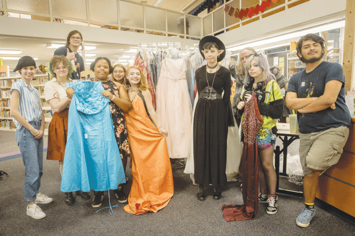  Teens organizing the Hazel Park District Library’s  annual prom have been sorting the more than 600 dresses and other accessories donated by Hope Closet.  