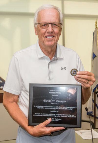 After deciding to resign from the Tri-City Fire Board, Chairman Dave Boerger received a plaque for his years of service on the board at a meeting July 25.  