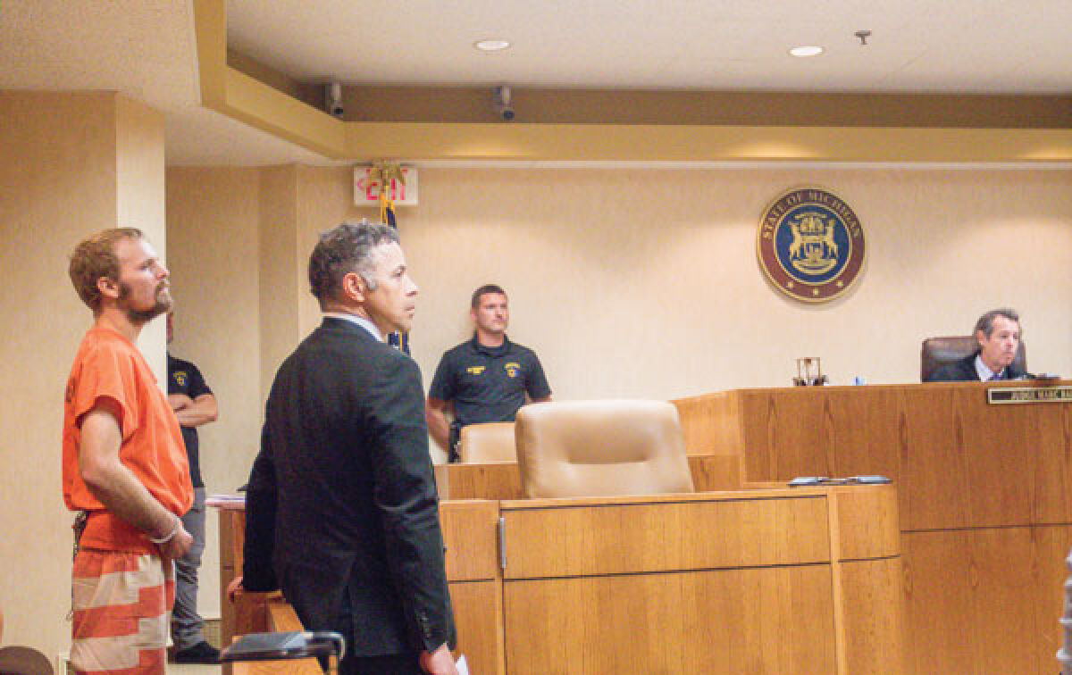  Judge Marc Barron, of the 48th District Court, presides over Jordan Worrall’s hearing Aug. 3. Also pictured is Worrall’s court-appointed attorney, Jalal Dallo, of Dallo Law in Bloomfield Hills. 