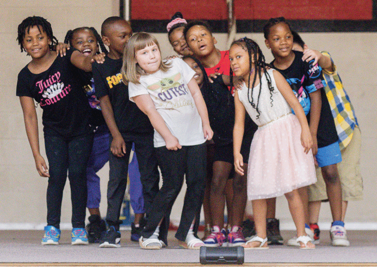  Several Van Dyke Public Schools summer school students dance hip-hop during the show Aug. 2. 