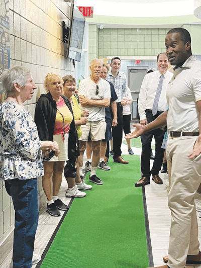  U.S. Rep. John James, right, who visited the Shelby Township Senior Center Aug. 10, is trying to get $1.5 million in Community Project Funding for the center in the 2024 federal budget. 