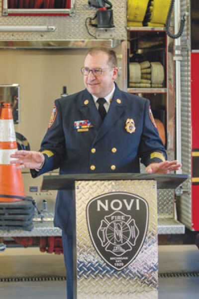  John Martin speaks to those gathered Aug. 8 for his promotion to fire chief. 
