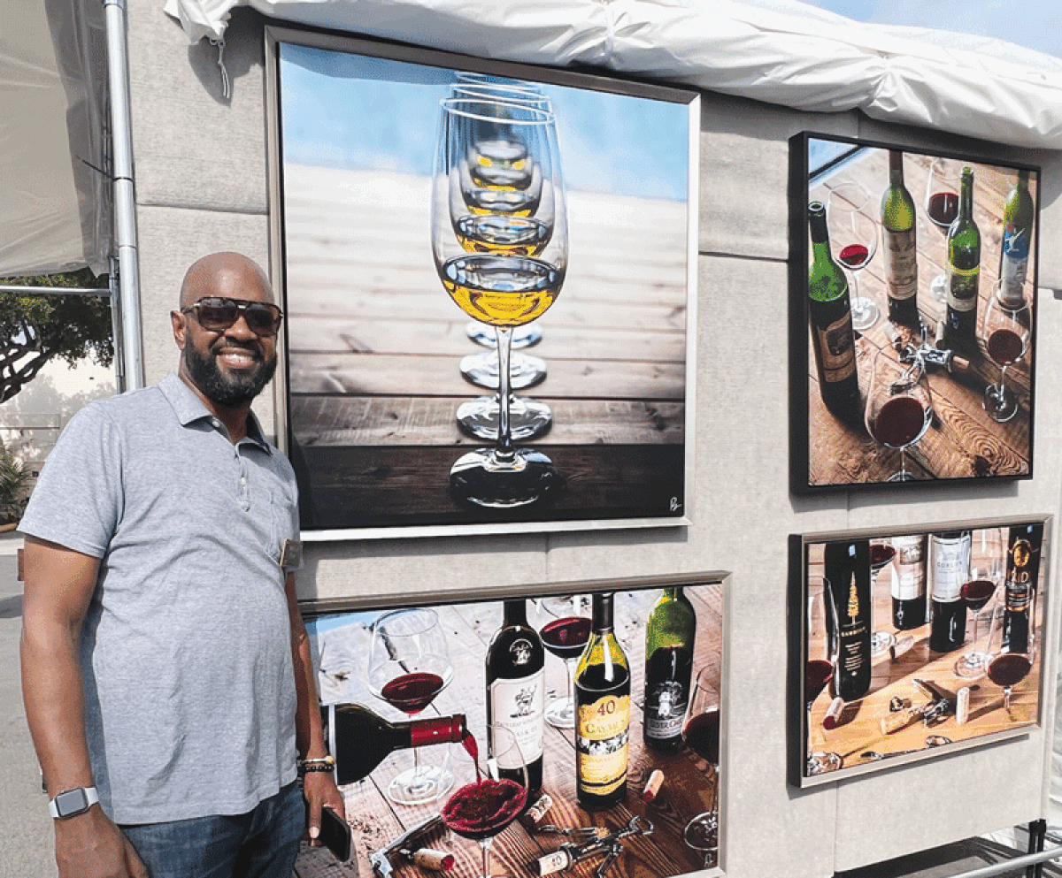  Marcus Ryan, of Marietta, Georgia, will have his hand-embellished fine art wine and bourbon photography for sale at the Art and Apples festival. 