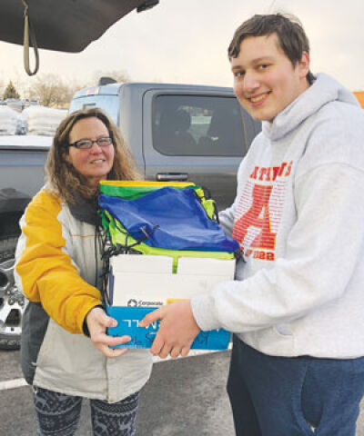  Every Eagle Scout has to complete a final project. Phil Rezanka chose to assemble and donate backpacks of school supplies to students in need. 