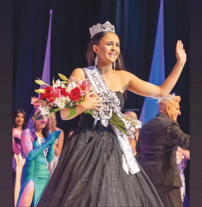 Avery Hill is emotional as she waves at the crowd after  being crowned Miss  Michigan Teen U.S.A. 