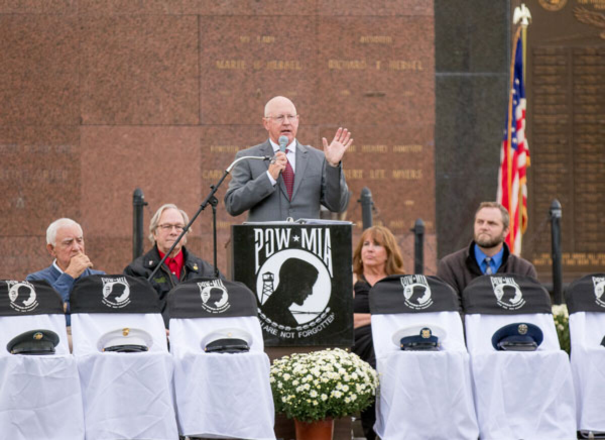  The ceremony for the 44th annual National POW/MIA Recognition Day takes place Sept. 15 at the Oakland Hills Memorial Gardens “Michigan Remembers” POW/MIA Memorial. Above, retired Navy Capt. Dennis L. Hopkins delivers the keynote address. 