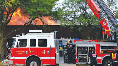  Firefighters contain structure fires at strip mall, detached garage 