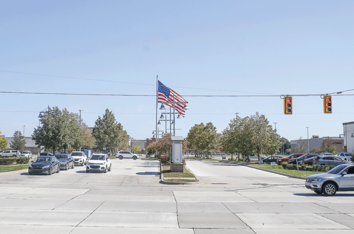 A view toward the traffic light at the shopping plaza on Dequindre Road south of 12 Mile Road in Madison Heights, near where the fatal hit-and-run incident occurred Sept. 13.  