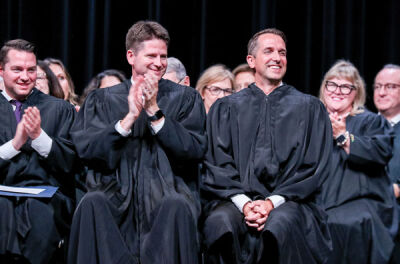  Newly sworn-in judge for the 44th District Court Andrew Kowalkowski is seated with his fellow judges, including Judge Derek Meinecke., at the end of his ceremony. 
