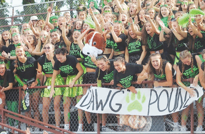  The Regina Bulldogs “Dawg Pound” student section cheers on their team  during Regina’s matchup against Bloomfield Hills Marian on Sept. 16  at Hazel Park High School. 