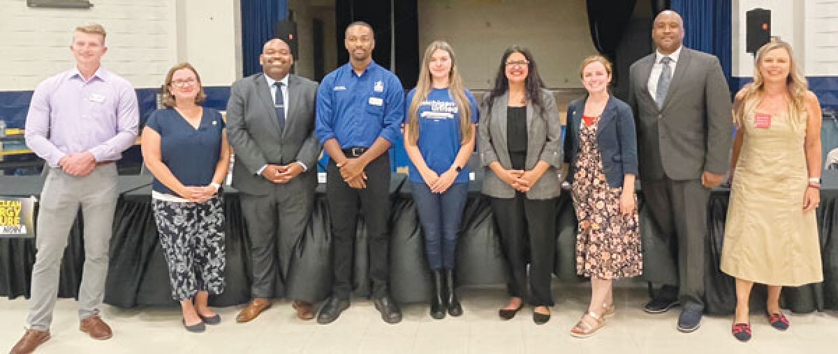  Panel members pose after the community discussion. From the left are moderator Hudson Villeneuve, Rep. Natalie Price, Rep. Jason Hoskins, Southfield Board of Education member Amani Johnson, Michigan United’s Em Perry, U.S. Rep. Rashida Tlaib, Rep. Erin Byrnes, Joy Southfield Community Development Corporation’s Gary Ringer, and Moms Clean Air Force’s Elizabeth Hauptmann. 