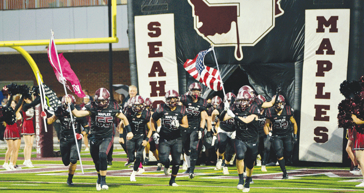  Birmingham Seaholm takes the field during the Maples’ matchup against Auburn Hills Avondale Oct. 6 at Seaholm High School. 