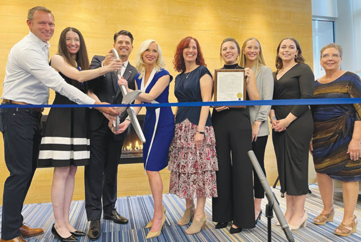  On Oct. 4, the Troy Chamber of Commerce and Walsh College cut the ribbon on the chamber’s new office space on the college’s campus. 