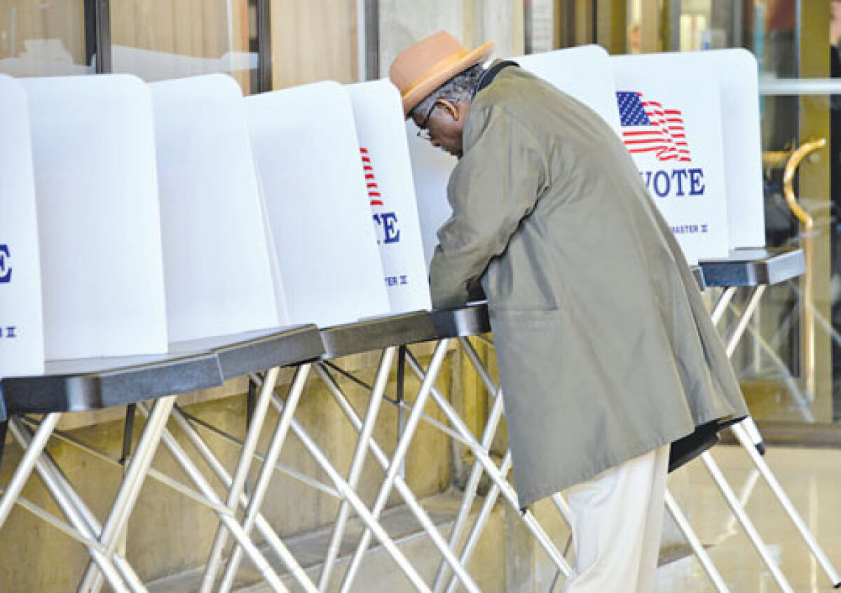  A voter makes his selections in a past election in Southfield 