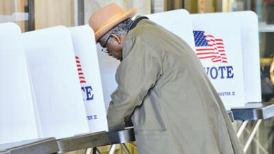  A voter makes his selections in a past election in Southfield 