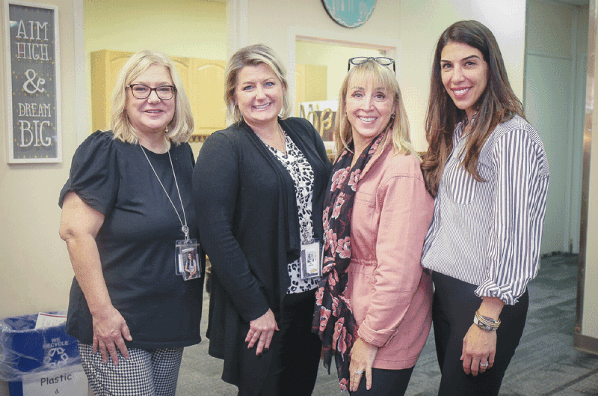 Sterling Heights High School counselors, left to right, Debbie Duffey, Holly Reese, Roselie Ruebelman and Areej Meengs work with students on a variety of issues, including mental health needs.  