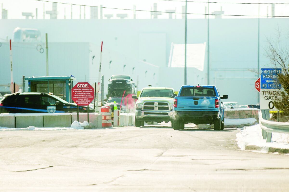  Vehicles enter and exit the Sterling Heights Assembly Plant earlier this year. 
