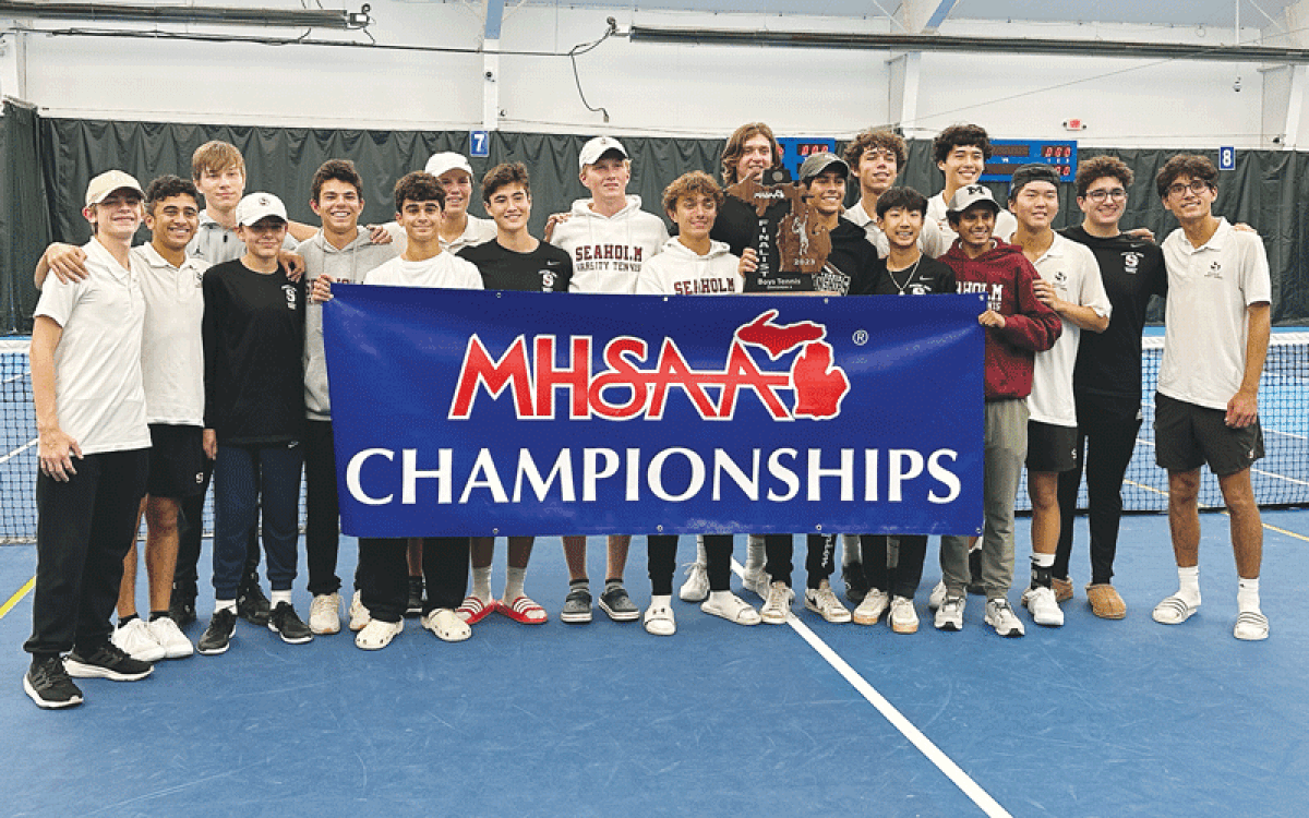  Birmingham Seaholm celebrates the program’s runner-up finish at the MHSAA Division 2 State Finals Oct. 21 at the Byron Center West Sports Complex. 