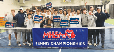  Bloomfield Hills Cranbrook Kingswood celebrates the program’s Division 3 State Championship title Oct. 21 at Kalamazoo College.  