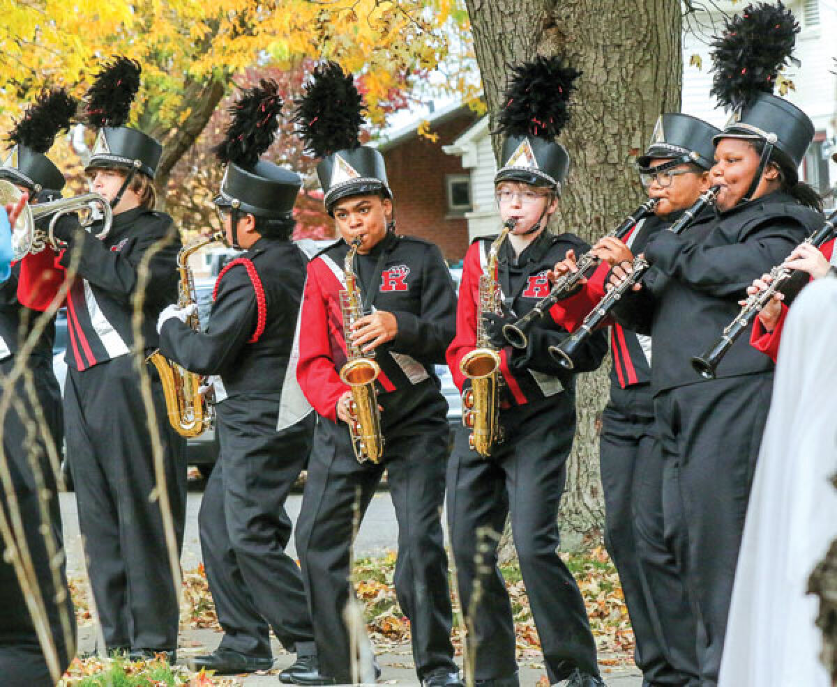  The Roseville High School Marching Band performs at the Osorio home Oct. 28. 