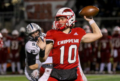  Chippewa Valley senior quarterback Andrew Schuster attempts a pass. 