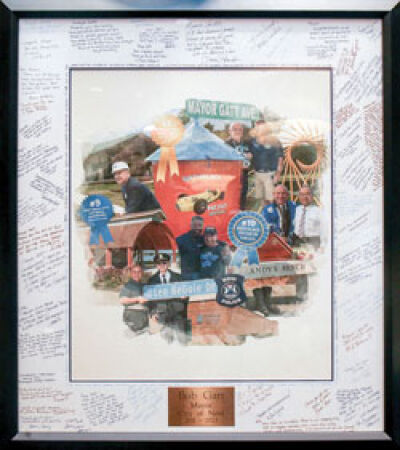  Gatt was presented with this framed picture showcasing some of the things he has done for the community, which was autographed by well wishers. 
