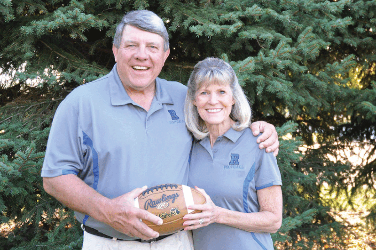  Bill and Ginny Ames were a dynamic duo on the Rochester High School football team as Bill served as the wide receivers coach and Ginny held the director of football operations title. 