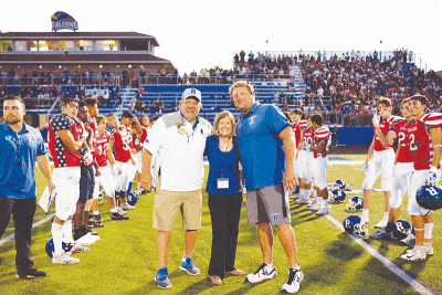  Bill and Ginny Ames celebrate their induction into the Rochester High School Athletic Hall of Fame Sept. 10, 2021, at Rochester High School. 