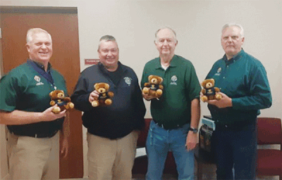  The St. Kieran Knights of Columbus Council 13983 recently presented the Shelby Township Fire Department with “Casey” teddy bears to help comfort children going through emergency situations. Pictured from left are K of C Grand Knight Jim Finn, Shelby Township Deputy Fire Marshal Brian Werner, and K of C members Joe Vogel and Al Jankowski. 