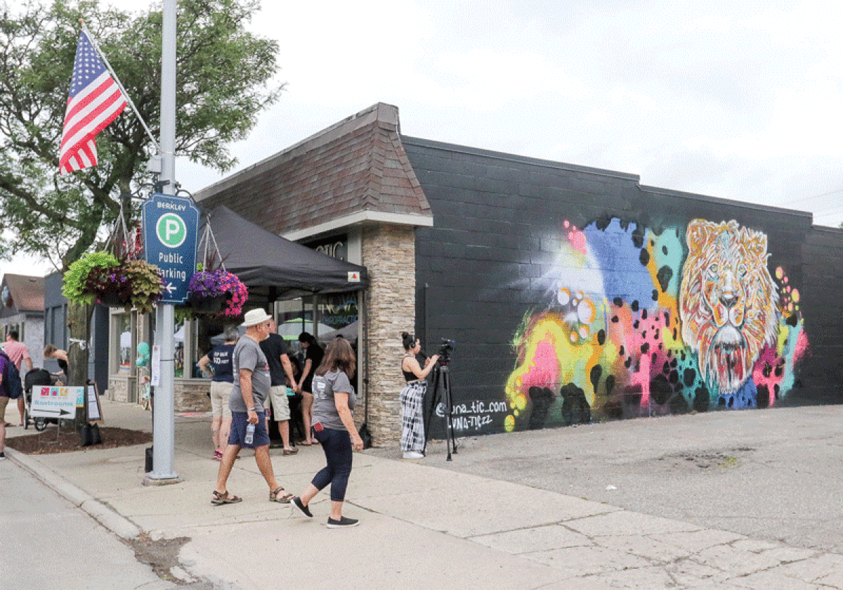  A new mural was completed on the side of Nova Chiropractic at 2745 Coolidge Highway during the Berkley Street Art Fest on July 16. The mural, designed by artist Luna Shaaya, features a lion surrounded by colorful paint splatter. 