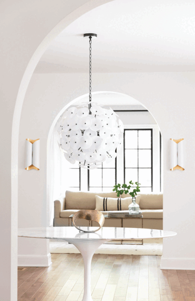  A chandelier brings artistic charm, as well as lighting, into a home. 